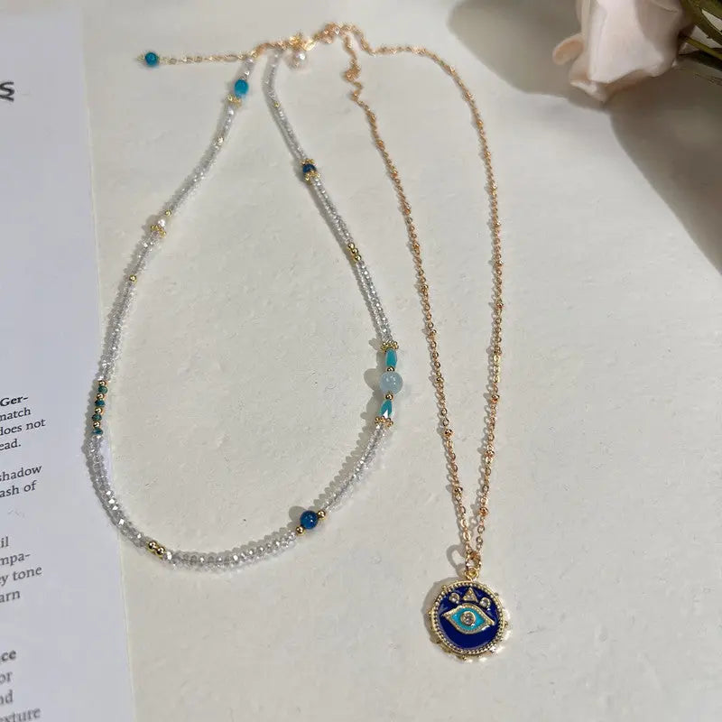 Two Stacked Necklaces With Natural Crystals